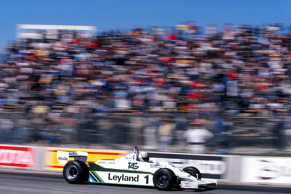 Race winner Alan Jones in a Williams FW07C.