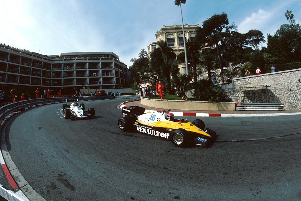 Eddie Cheever in a Renault RE40, leads Jacques Laffite in his Williams FW08C.