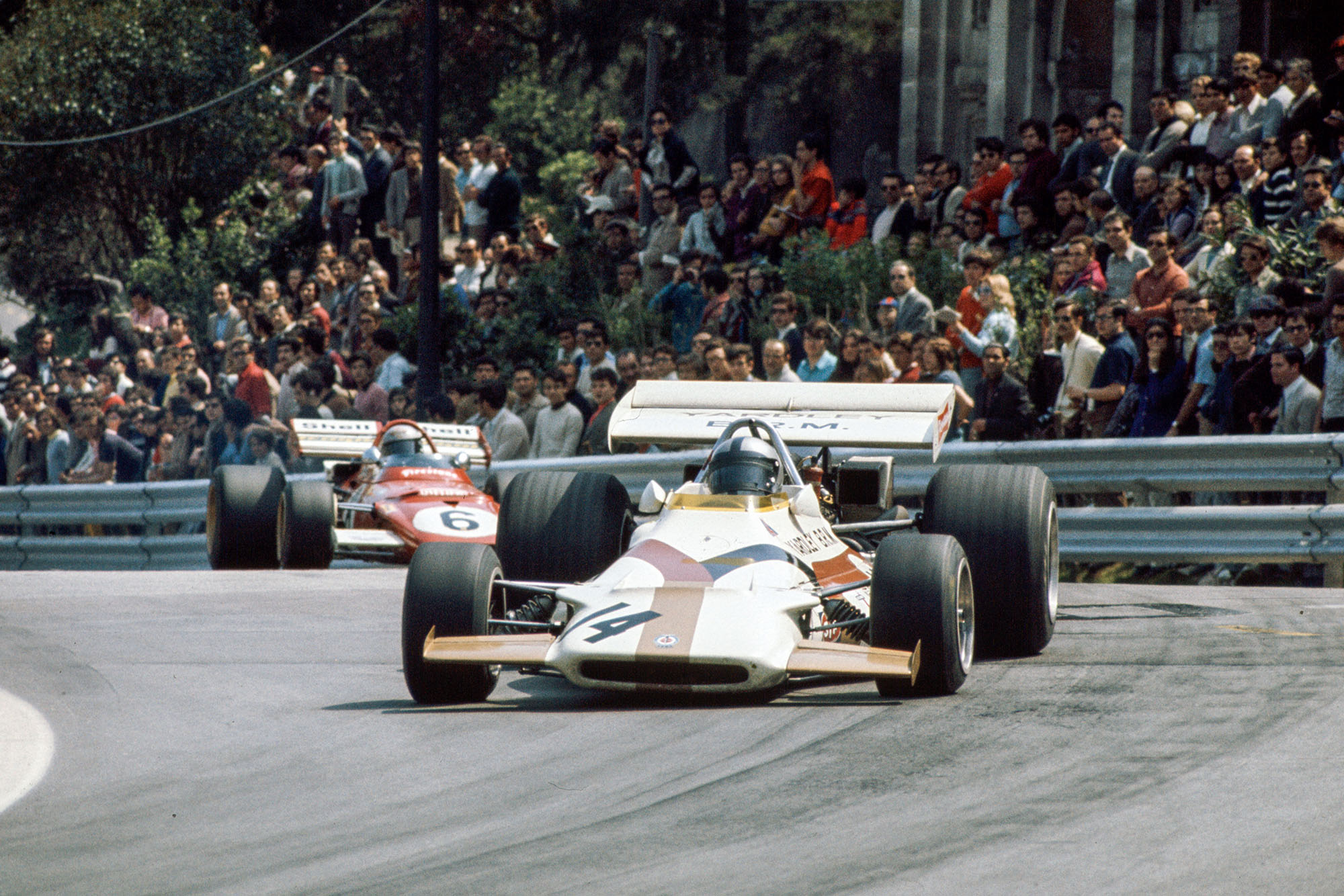 BRM's Pedro Rodriguez leads the Ferrari of Mario Andretti