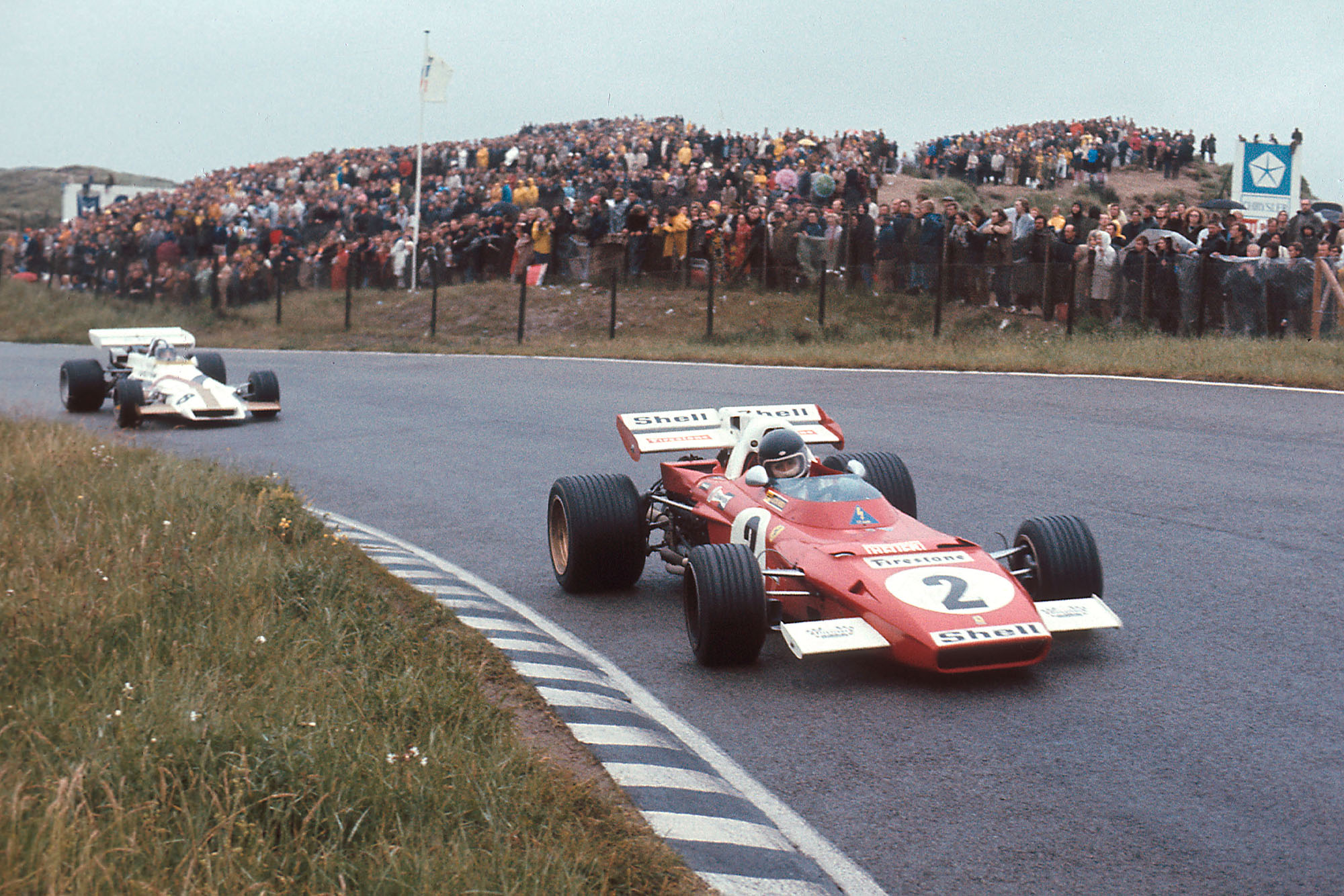 Pedro Rodriguez (BRM) follows Jacky Ickx (Ferrari) at the 1971 Dutch Grand Prix.