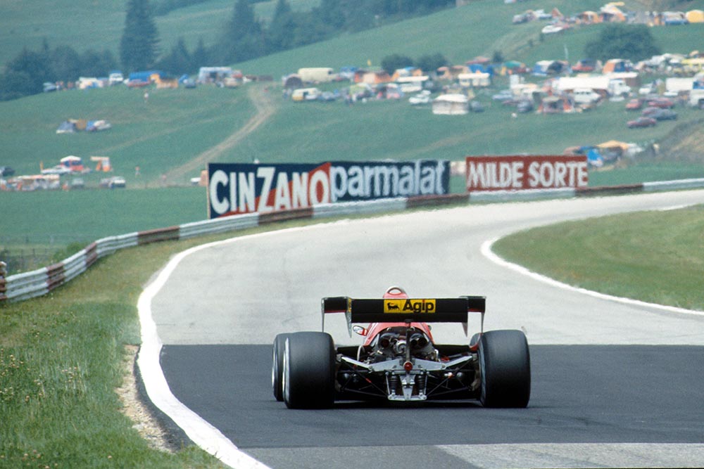 Cars race against incredible scenery.