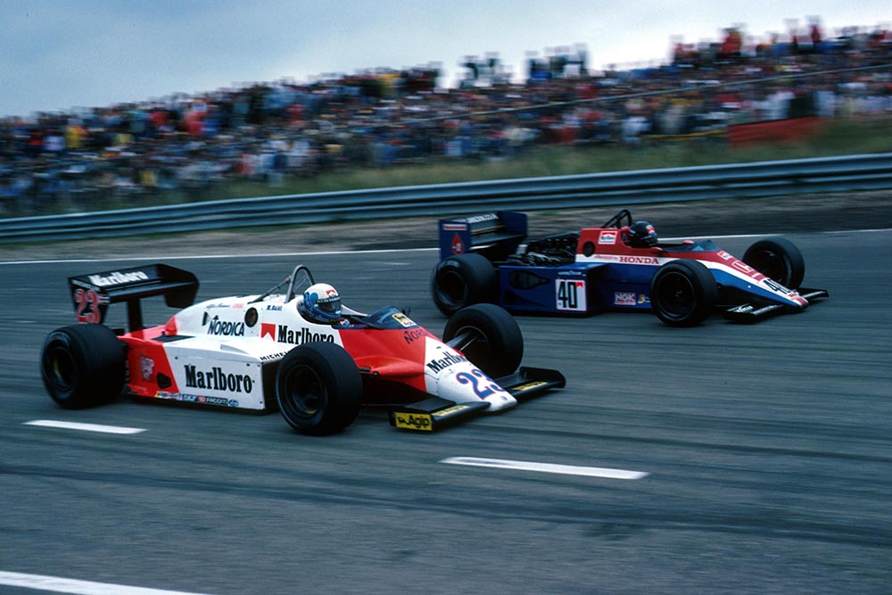 Mauro Baldi (Alfa Romeo 183T) attempts to pass on the inside of Stefan Johansson (Spirit Honda 201C).