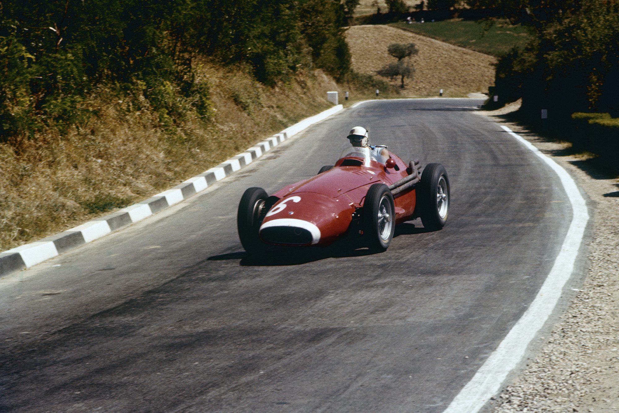 Harry Schell in his Maserati 250F, 1957 Pescara Grand Prix.