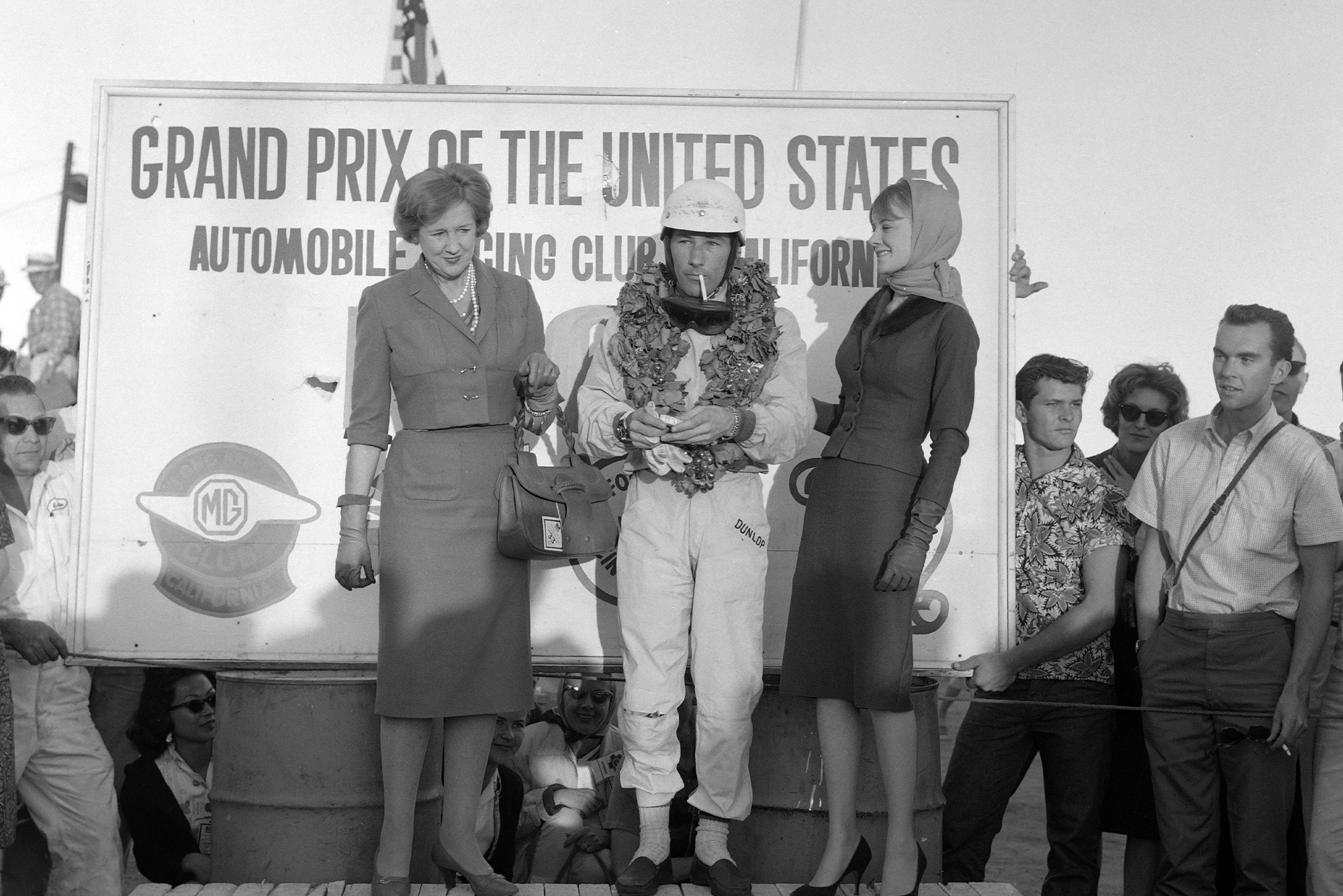 Moss celebrates on the podium