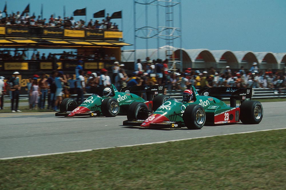 Ricardo Patrese and teamate Eddie Cheever battle in their Alfa Romeo 184Ts.