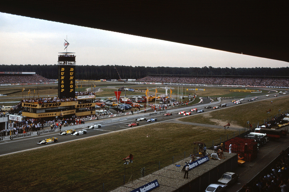 Alain Prost (Renault RE30) makes a clean getaway on the left side of the track at the start of the race.