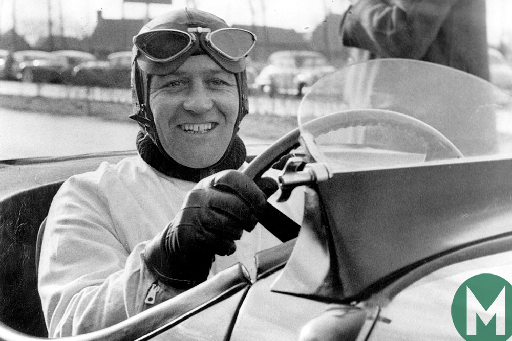 Norman Dewis at the wheel of a Jaguar XK120 in 1952