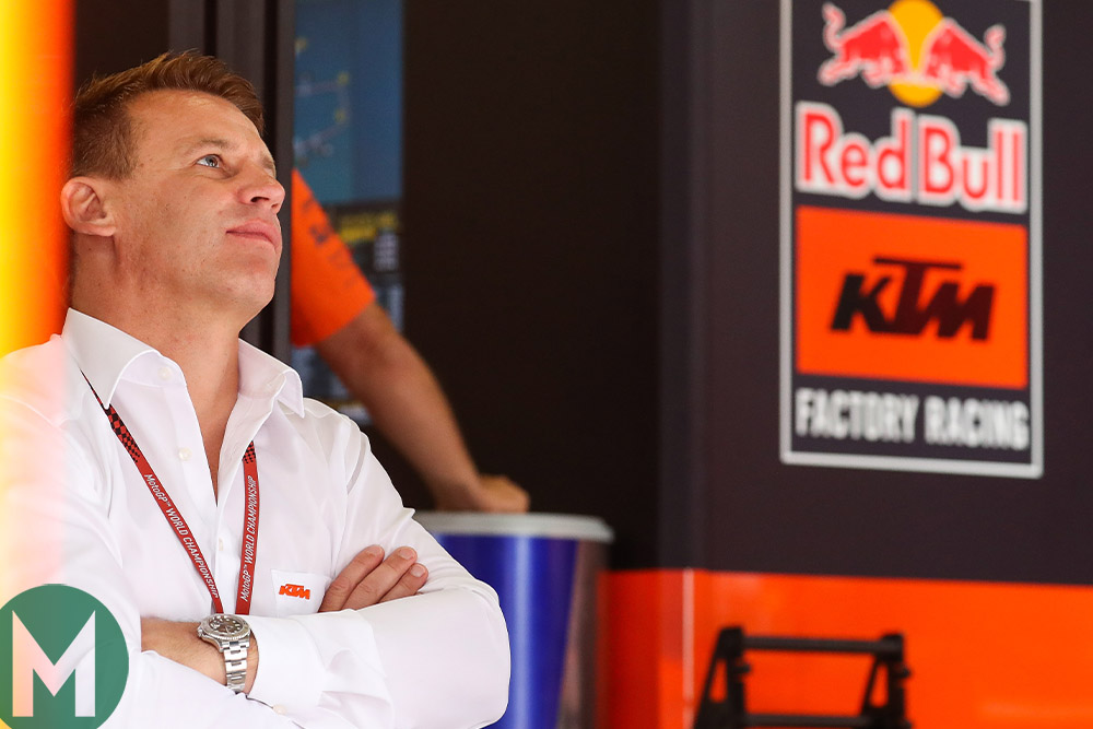 KTM's Pit Beirer stands in the KTM garage