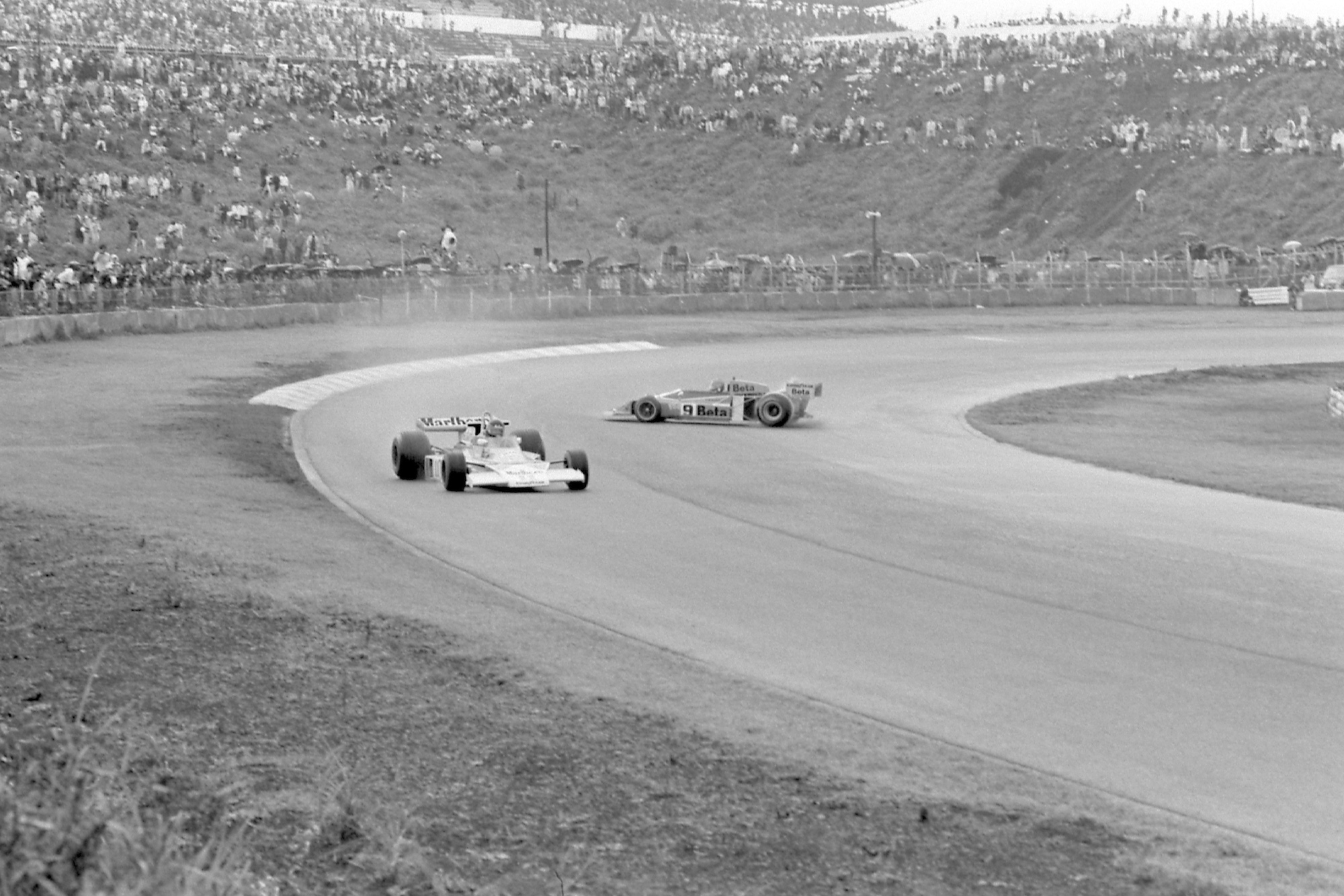 James Hunt drives away from the spinning Vittorio Brambilla in the 1976 Japanese Grand Prix
