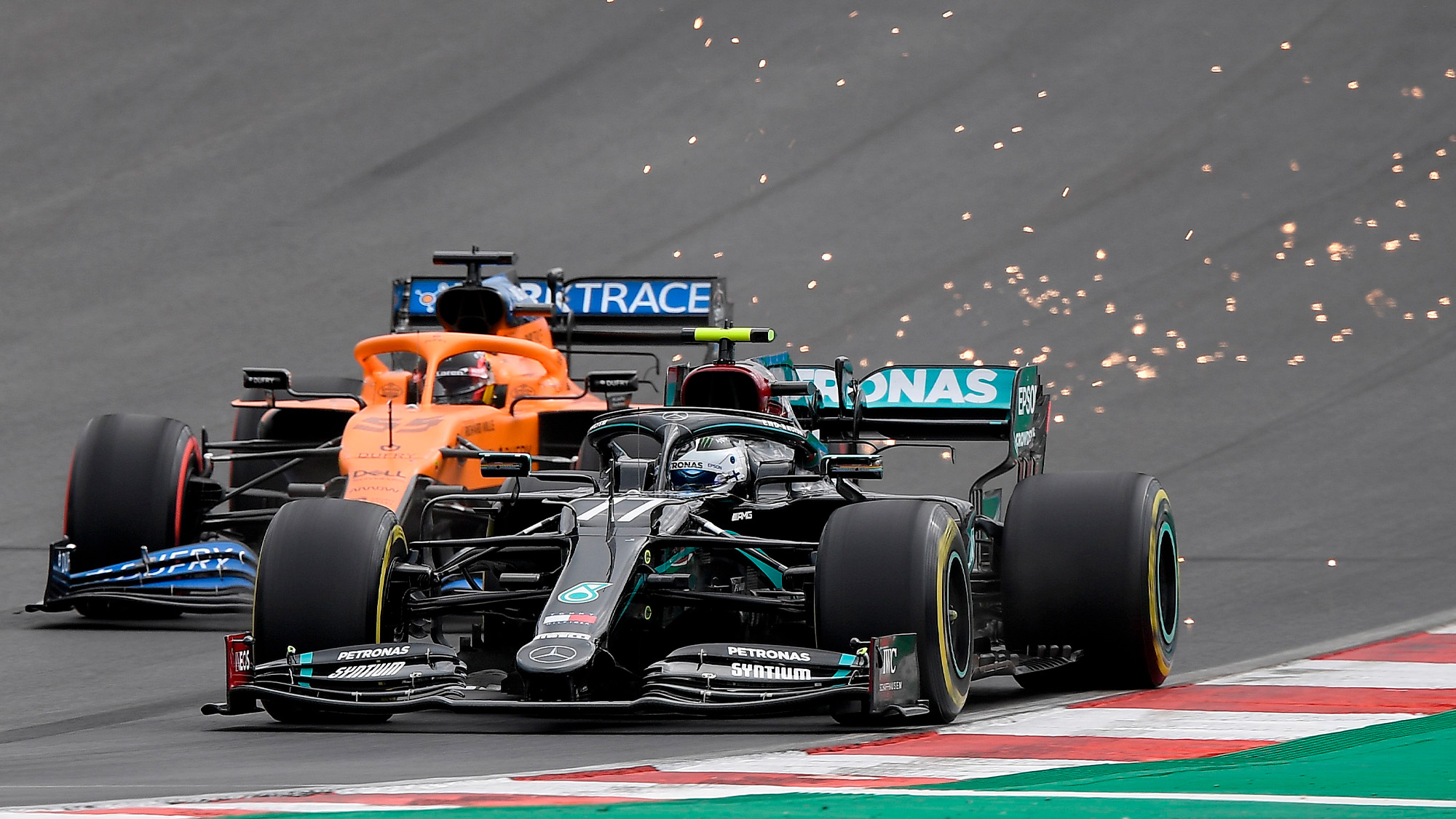 Valtteri Bottas passes Lando Norris for the lead of the 2020 Portuguese Grand Prix at Portimao