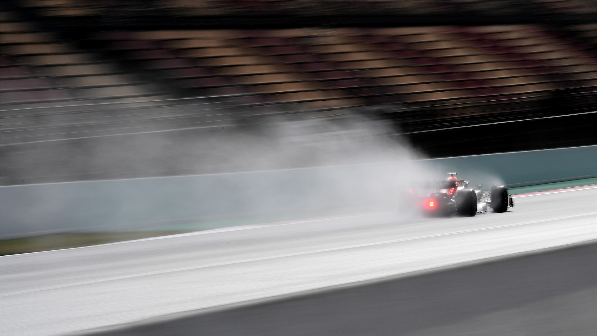 Spray from the Red Bull during wet running in 2022 F1 testing